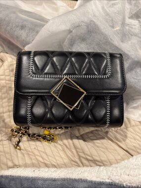 Black Quilted Women’s Crossbody Bag with Gold Geometric Clasp; Excellent